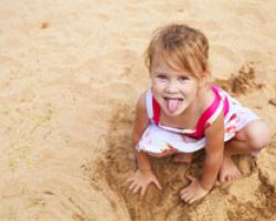 Little girl in sandbox